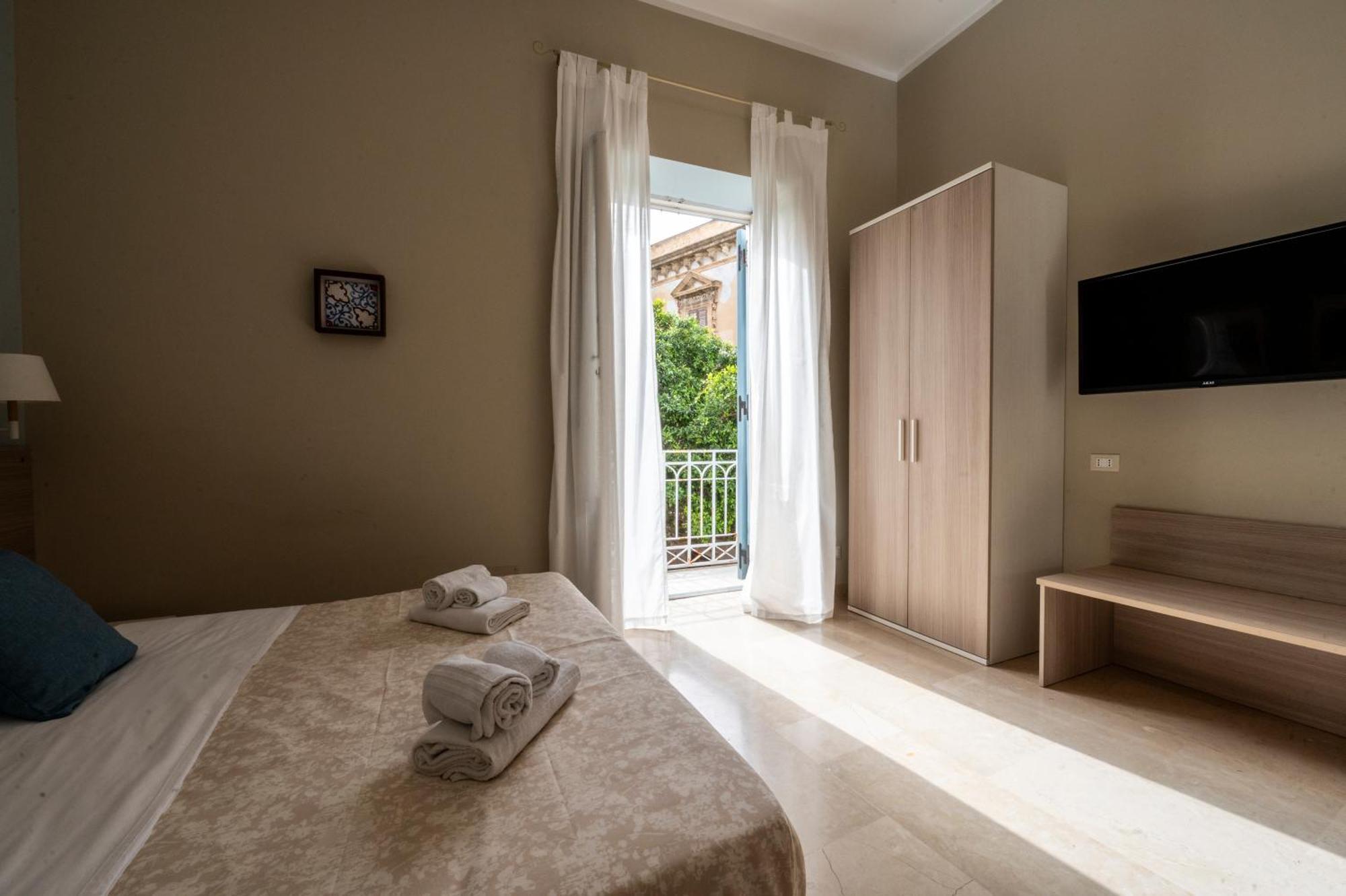 Le Mura - Charme Rooms Трапані Номер фото